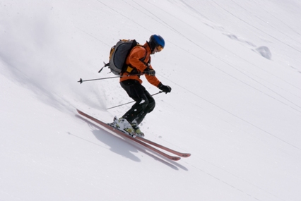 A skier down the slope